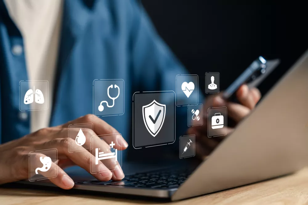 Health care, insurance, medical protection, online system, patient safety, hospital services, claim process, digital healthcare, health technology, secure data, policy coverage, medical plan. / Foto: Champpixs, Getty Images