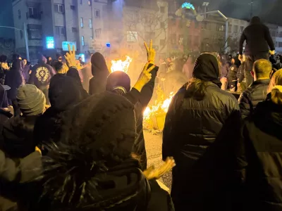 In this photo obtained by The Associated Press, Iranians attend an anti-government protest in Tehran, Iran, Friday, Jan. 9, 2026. (UGC via AP)