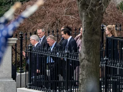 Denmark's Foreign Minister Lars L&oslash;kke Rasmussen, third from left, Greenland's Foreign Minister Vivian Motzfeldt, not shown, and their delegations leave the Old Eisenhower Executive Office Building on the grounds of the White House, Wednesday, Jan. 14, 2026, in Washington. (AP Photo/Alex Brandon)