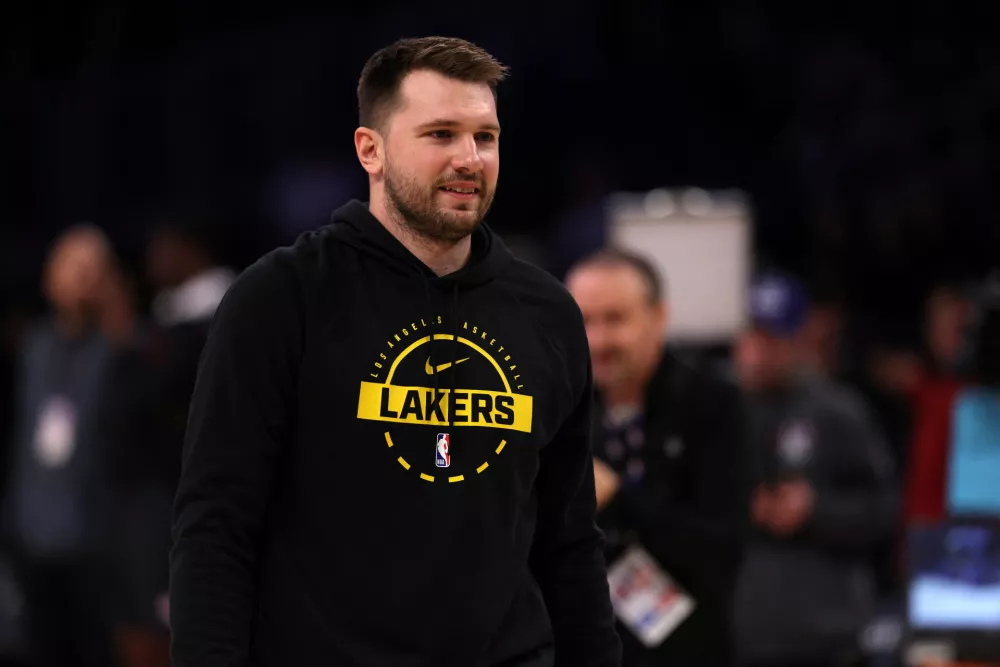 Jan 13, 2026; Los Angeles, California, USA; Los Angeles Lakers guard Luka Doncic (77) warms up before the game against the Atlanta Hawks at Crypto.com Arena. Mandatory Credit: Kiyoshi Mio-Imagn Images