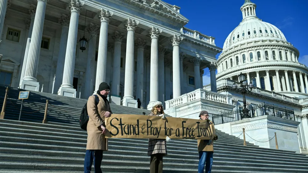 Demonstrators pray and rally in support of nationwide protests in Iran, on Capitol Hill in Washington, D.C., U.S., January 15, 2026. REUTERS/Annabelle Gordon