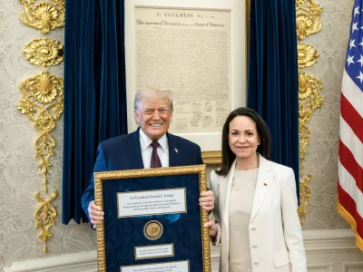 U.S. President Trump meets with Venezuelan opposition leader Maria Corina Machado in the Oval Office, during which she presented the President with her Nobel Peace Prize, in Washington, D.C, U.S., released January 15, 2026. Daniel Torok/The White House/Handout via REUTERS  THIS IMAGE HAS BEEN SUPPLIED BY A THIRD PARTY