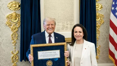 U.S. President Trump meets with Venezuelan opposition leader Maria Corina Machado in the Oval Office, during which she presented the President with her Nobel Peace Prize, in Washington, D.C, U.S., released January 15, 2026. Daniel Torok/The White House/Handout via REUTERS  THIS IMAGE HAS BEEN SUPPLIED BY A THIRD PARTY