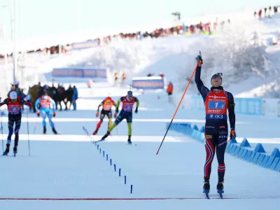 Biathlon - Biathlon World Cup - Oberhof, Germany - January 11, 2026 Norway's Vetle Sjaastad Christiansen crosses the finish line to win the men's 4x7.5km relay REUTERS/Matthew Childs