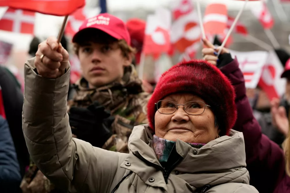 People take part in the "Hands Off Greenland" protest, held under the slogans "Hands Off Greenland" and "Greenland for Greenlanders", after the White House said that the U.S. was considering a range of options to acquire Greenland, including the use of military force, in Copenhagen, Denmark, January 17, 2026. Ritzau Scanpix/Emil Helms/via REUTERS  ATTENTION EDITORS - THIS IMAGE WAS PROVIDED BY A THIRD PARTY. DENMARK OUT. NO COMMERCIAL OR EDITORIAL SALES IN DENMARK.