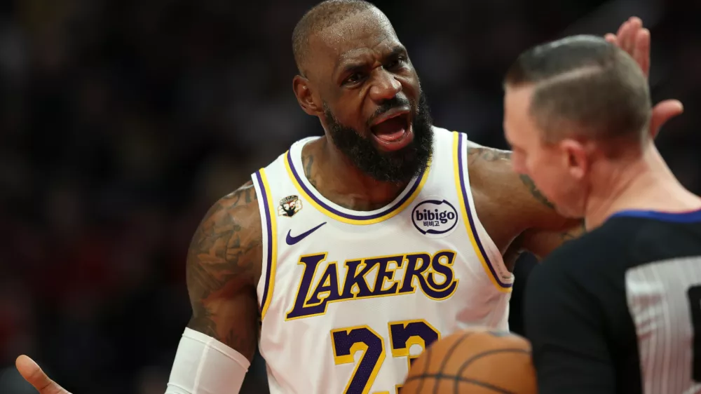 Los Angeles Lakers forward LeBron James (23) argues with referee Justin Van Duyne (64) after being given a flagrant foul during the second half of an NBA basketball game against the Portland Trail Blazers Saturday, Jan. 17, 2026, in Portland, Ore. (AP Photo/Amanda Loman)