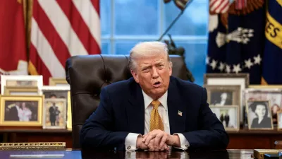 FILE PHOTO: U.S. President Donald Trump is interviewed by Reuters White House correspondent Steve Holland (not pictured) during an exclusive interview in the Oval Office in the White House in Washington, D.C., U.S., January 14, 2026. REUTERS/Evelyn Hockstein/File Photo