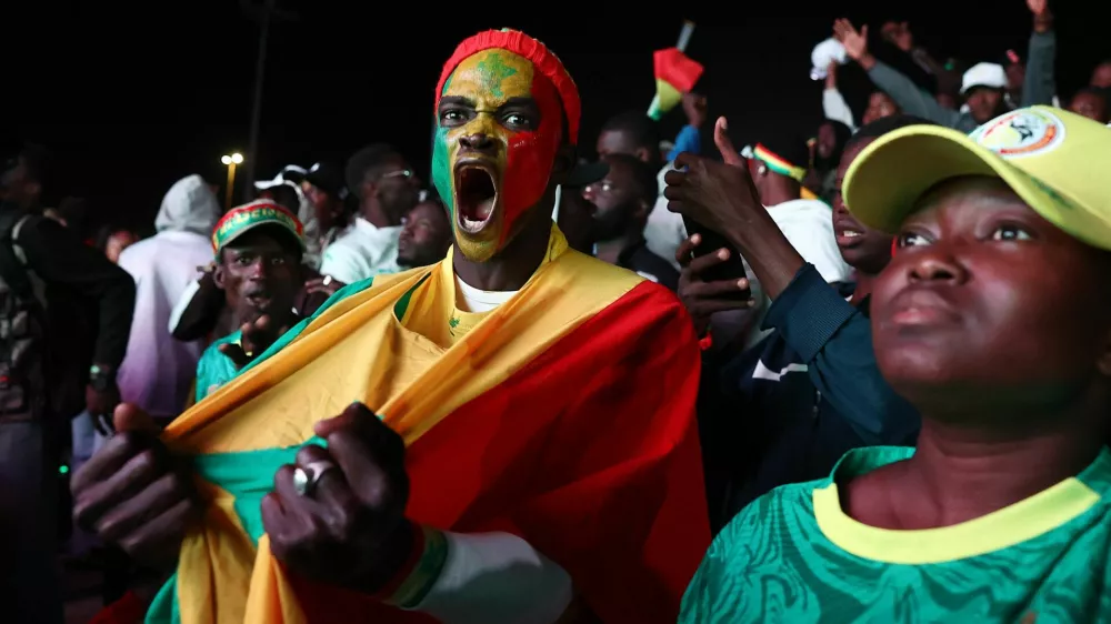Soccer Football - CAF Africa Cup of Nations - Morocco 2025 - Final - Fans watch Senegal v Morocco - Dakar, Senegal - January 18, 2026 Senegal fans react as they watch the final match between Senegal and Morocco in Dakar REUTERS/Zohra Bensemra