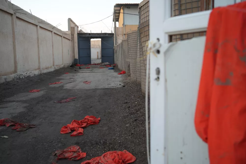 20 January 2026, Syria, Al-hasakah: Inmates' clothes lie on the floor of Al Shaddadi prison, after the withdrawal of the Syrian Democratic Forces and its takeover by the Syrian army. Inmates, members of the Islamic State, fled the facility. Photo: Moawia Atrash/dpa