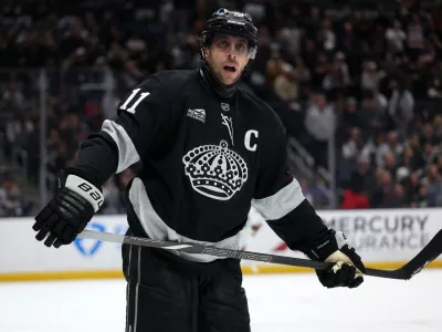 Jan 3, 2026; Los Angeles, California, USA; Los Angeles Kings center Anze Kopitar (11) looks on during overtime against the Minnesota Wild at Crypto.com Arena. Mandatory Credit: Kiyoshi Mio-Imagn Images