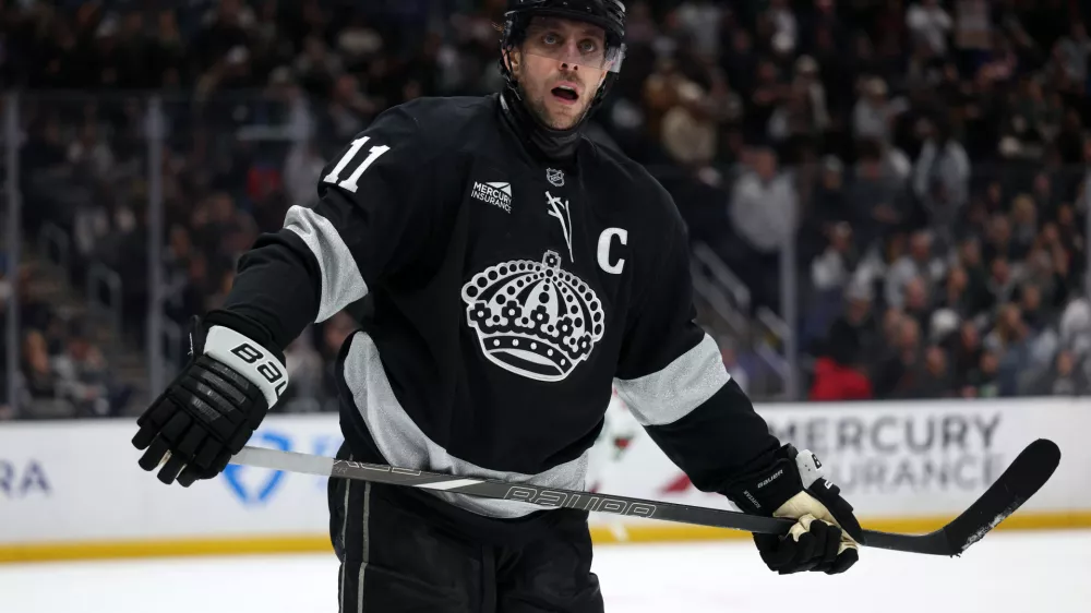 Jan 3, 2026; Los Angeles, California, USA; Los Angeles Kings center Anze Kopitar (11) looks on during overtime against the Minnesota Wild at Crypto.com Arena. Mandatory Credit: Kiyoshi Mio-Imagn Images