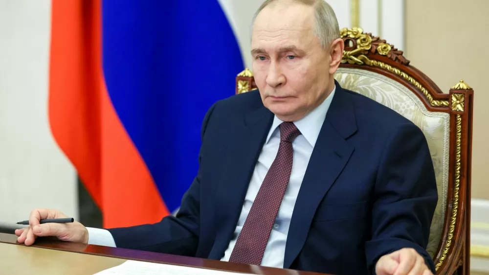 Russian President Vladimir Putin chairs a meeting with members of the government via video link at the Kremlin in Moscow, Russia January 21, 2026. Sputnik/Vyacheslav Prokofyev/Pool via REUTERS ATTENTION EDITORS - THIS IMAGE WAS PROVIDED BY A THIRD PARTY.