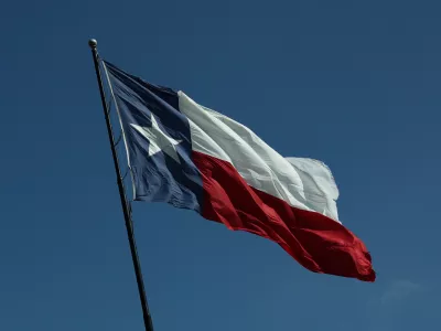 Texan flag is seen in Texas, United States on October 21, 2025. (Photo by Jakub Porzycki/NurPhoto)NO USE FRANCE