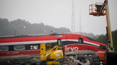 A train carriage after it was removed from the tracks, following a deadly derailment of two high-speed trains near Adamuz, in Cordoba, Spain, January 21, 2026. REUTERS/Ana Beltran