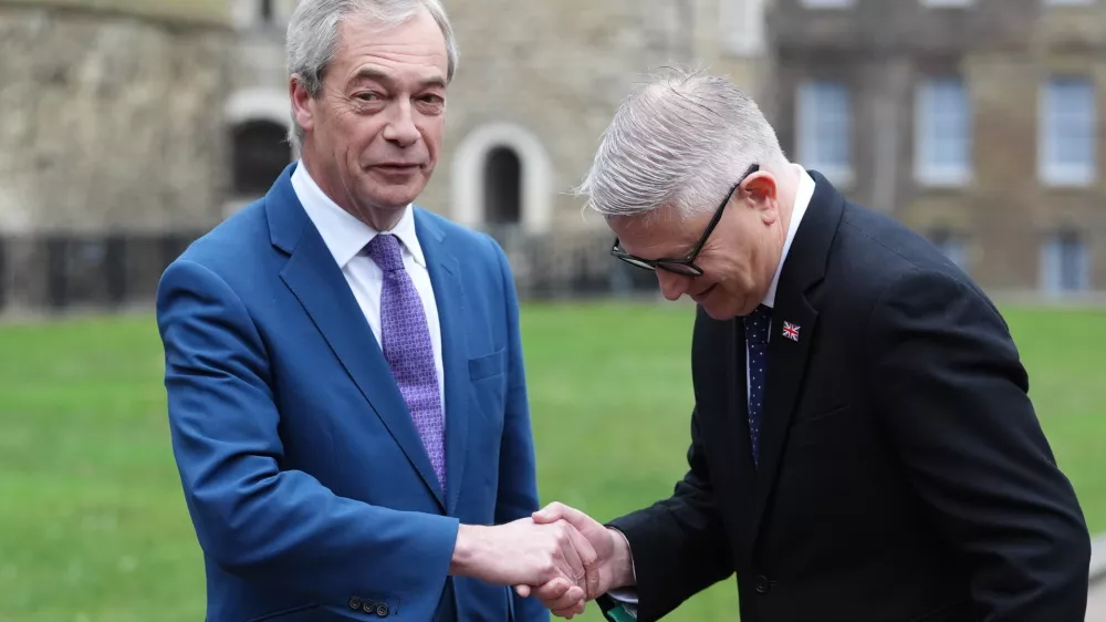 PA via ReutersReform UK leader Nigel Farage and Andrew Rosindell on College Green in Westminster, central London. Rosindell became the second Conservative MP to defect to Reform in a week. Picture date: Monday January 19, 2026.No Use UK. No Use Ireland. No Use Belgium. No Use France. No Use Germany. No Use Japan. No Use China. No Use Norway. No Use Sweden. No Use Denmark. No Use Holland. No Use Australia.