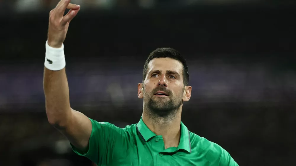 Tennis - Australian Open - Melbourne Park, Melbourne, Australia - January 24, 2026 Serbia's Novak Djokovic celebrates after winning his third round match against Netherlands' Botic van de Zandschulp REUTERS/Tingshu Wang