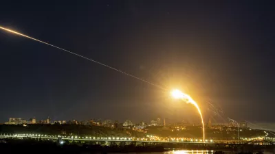 Ukrainian air defense intercepts a Shahed drone mid-air in the third Russia aerial attack on the capital in the last 24 hours in Kyiv, Ukraine, Tuesday, May 30, 2023. (AP Photo/Evgeniy Maloletka)
