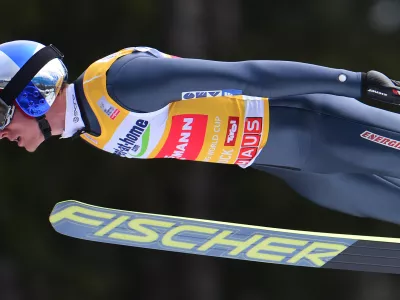 Austria's Gregor Schlierenzauer soars through the air during the trial jump at the third stage of the four hills ski jumping tournament in Innsbruck, Austria, Thursday, Jan. 3, 2013. (AP Photo/Kerstin Joensson)
