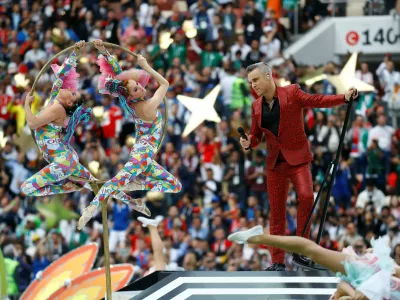Soccer Football - World Cup - Opening Ceremony - Luzhniki Stadium, Moscow, Russia - June 14, 2018 Robbie Williams performs during the opening ceremony  REUTERS/Kai Pfaffenbach