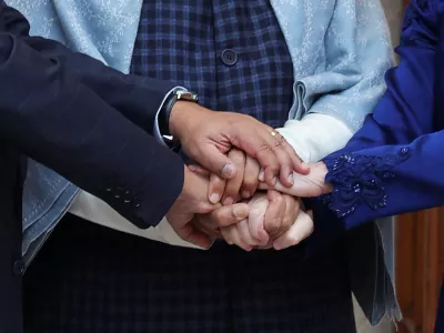 European Council President Antonio Costa, European Commission President Ursula von der Leyen and Indian Prime Minister Narendra Modi hold hands as they pose during a photo opportunity ahead of their meeting at the Hyderabad House in New Delhi, India, January 27, 2026. REUTERS/Altaf Hussain
