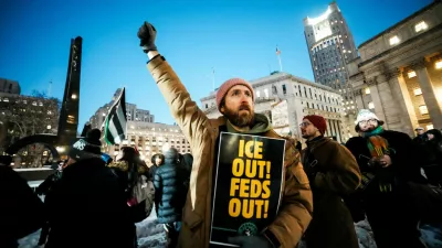 Demonstrators take part in a vigil and protest over the fatal shooting of a man identified as Alex Pretti by federal immigration agents in Minneapolis, Minnesota, in New York City, U.S., January 27, 2026. REUTERS/Eduardo Munoz   TPX IMAGES OF THE DAY