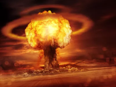 A nuclear bomb explosion causing shock waves. Mixed media illustration.