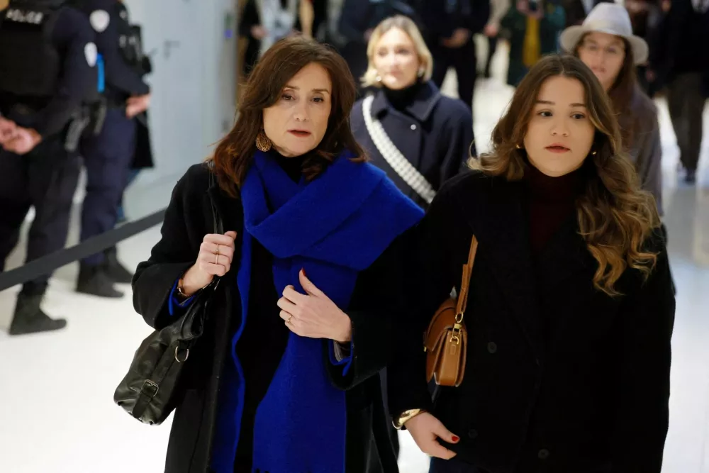 FILE PHOTO: French member of parliament Sandrine Josso arrives for the trial of former French Senator Joel Guerriau for allegedly spiking her drink with the intention of sexually assaulting her, at the courthouse in Paris, France, January 26, 2026. REUTERS/Stephanie Lecocq/File Photo
