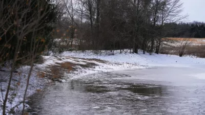 A pond where neighbors say three young boys died after falling into the water is seen Tuesday, Jan. 27, 2026, in Bonham, Texas. (AP Photo/Julio Cortez)