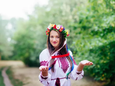 Portrait of a girl in nationac ukrainian clothes in the park