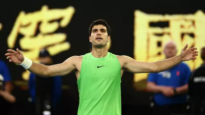 Tennis - Australian Open - Melbourne Park, Melbourne, Australia - January 30, 2026 Spain's Carlos Alcaraz celebrates after winning his semi final match against Germany's Alexander Zverev REUTERS/Tingshu Wang