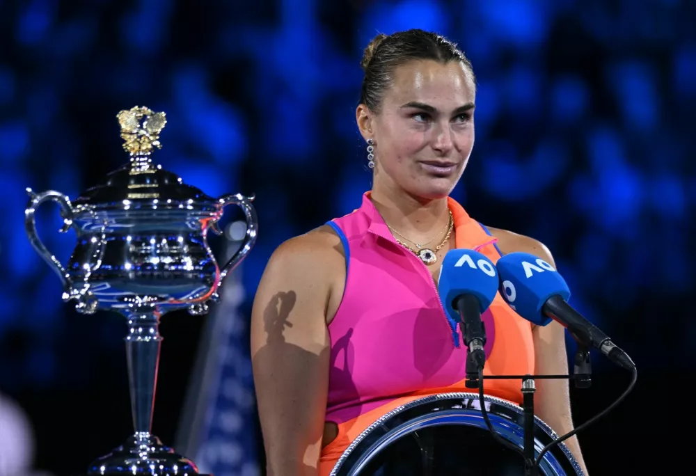 Tennis - Australian Open - Melbourne Park, Melbourne, Australia - January 31, 2026 Belarus' Aryna Sabalenka poses with the runners up trophy after the women's singles final against Kazakhstan's Elena Rybakina REUTERS/Jaimi Joy