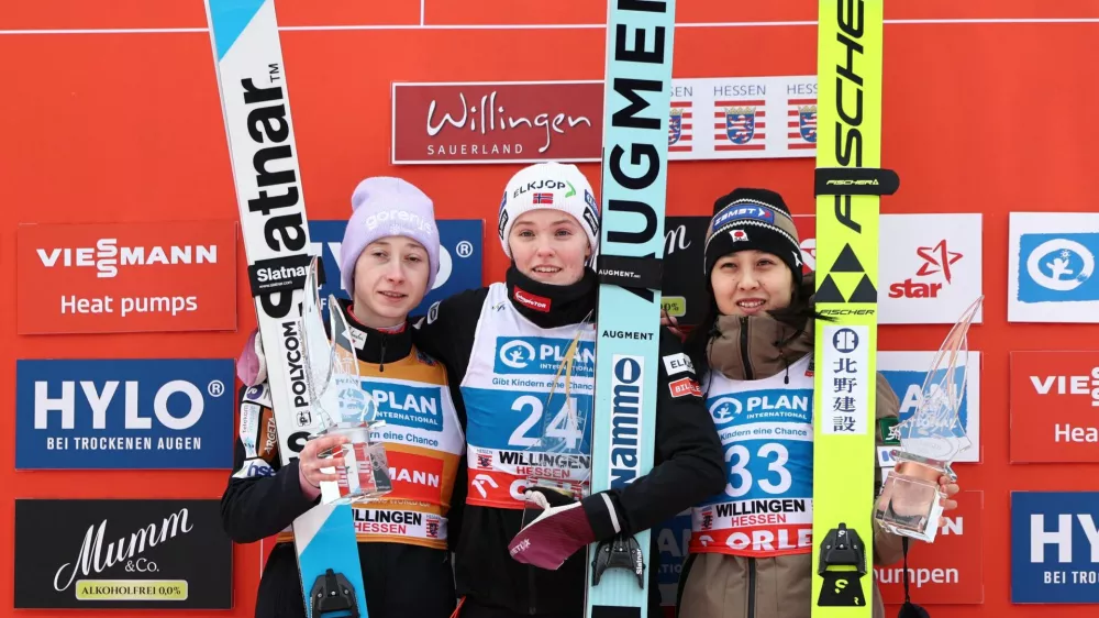 Ski Jumping - FIS Ski Jumping World Cup - Willingen, Germany - January 31, 2026 Norway's Eirin Maria Kvandal celebrates after winning the women's individual HS147 with second placed Slovenia's Nika Prevc and third placed Japan's Nozomi Maruyama REUTERS/Leon Kuegeler