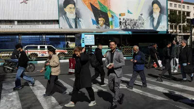 People walk on a street in Tehran, Iran, January 31, 2026. Majid Asgaripour/WANA (West Asia News Agency) via REUTERS ATTENTION EDITORS - THIS PICTURE WAS PROVIDED BY A THIRD PARTY