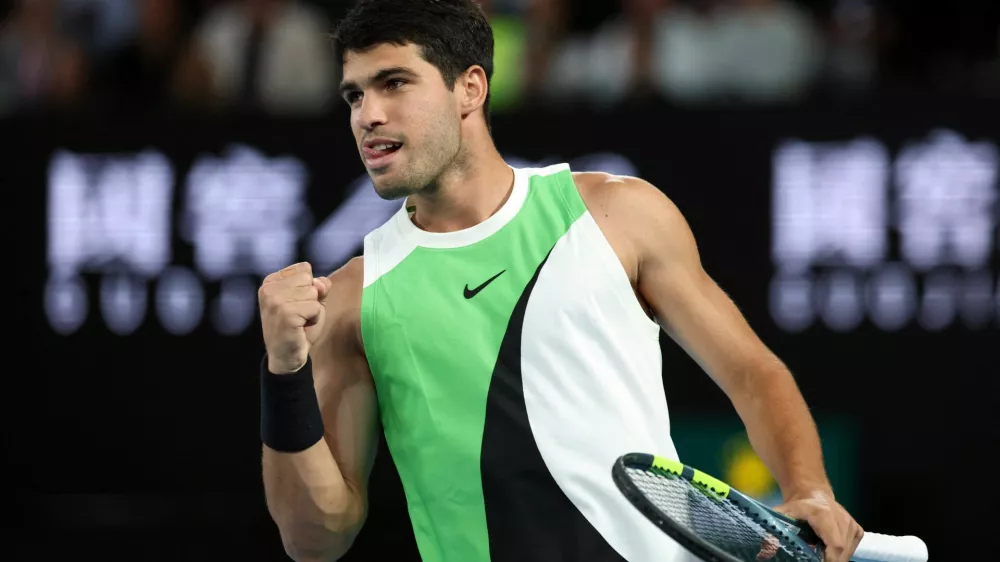 Tennis - Australian Open - Melbourne Park, Melbourne, Australia - February 1, 2026 Spain's Carlos Alcaraz reacts during the men's singles final against Serbia's Novak Djokovic REUTERS/Edgar Su