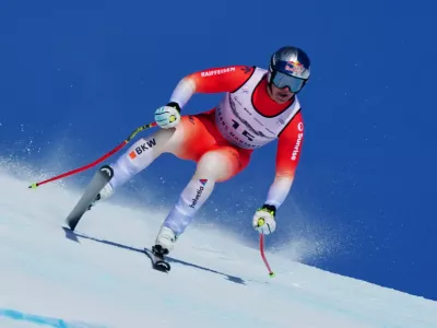 Switzerland's Franjo von Allmen speeds down the course during an alpine ski, men's World Cup downhill, in Crans Montana, Switzerland, Sunday, Feb. 1, 2026. (AP Photo/Pier Marco Tacca)