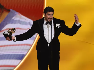 Bad Bunny accepts the award for Album of the Year for "Debi Tirar Mas Fotos" during the 68th Annual Grammy Awards in Los Angeles, California, U.S., February 1, 2026. REUTERS/Daniel Cole