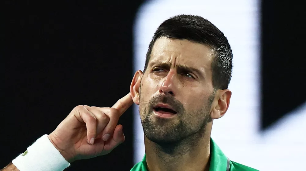 Tennis - Australian Open - Melbourne Park, Melbourne, Australia - January 24, 2026 Serbia's Novak Djokovic celebrates and gestures to crowd after winning his third round match against Netherlands' Botic van de Zandschulp REUTERS/Tingshu Wang  TPX IMAGES OF THE DAY