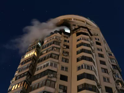 Smoke billows from an apartment building after it was struck by a drone during Russian missile and drone attacks, in Kyiv, Ukraine, February 3, 2026. REUTERS/Thomas Peter