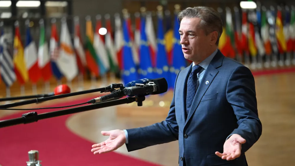 Slovenia's Prime Minister Robert Golob speaks with the media as he arrives for the EU summit in Brussels, Thursday, Jan. 22, 2026. (AP Photo/Harry Nakos)