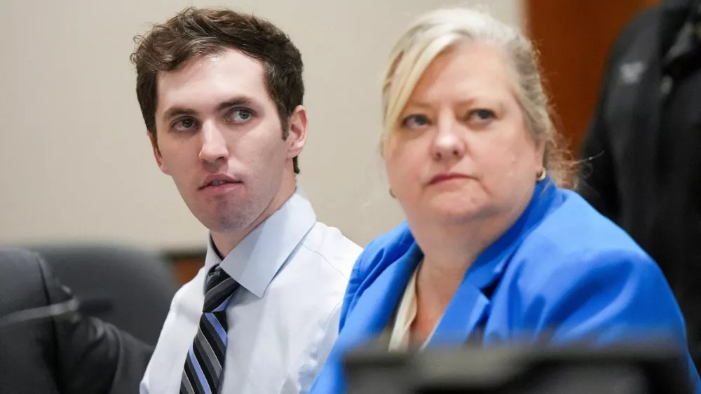 FILE PHOTO: Tyler Robinson, suspect in the fatal shooting of Charlie Kirk, sits beside defense attorney Kathryn Nester during a hearing in 4th District Court in Provo, Utah, U.S., on January 16, 2026. Bethany Baker/Pool via REUTERS/File Photo