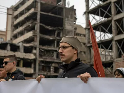 People attend a protest in front of a former army headquarters over a new law to speed its conversion into a luxury compound leased to an investment company founded by U.S. President Donald Trump's son-in-law, Jared Kushner, in Belgrade, Serbia, November 11, 2025. REUTERS/Marko Djurica