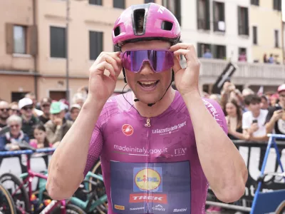 Denmark's Mads Pedersen smiles at the start of stage 14 of the Giro d'Italia cycling race from Treviso to Nova Gorica/Gorizia, Italy, Saturday, May 24, 2025. (Massimo Paolone/LaPresse via AP)