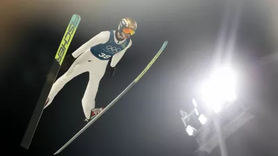 Milano Cortina 2026 Olympics - Ski Jumping - Men's Normal Hill Training - Predazzo Ski Jumping Stadium, Predazzo, Italy - February 5, 2026 Kacper Tomasiak of Poland in action during training REUTERS/Kacper Pempel