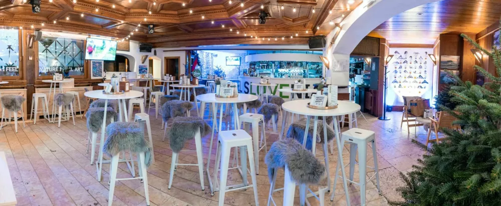 ZOI 2026, slovenska hi&scaron;a, cortina