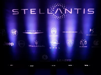 FILE PHOTO: The logo of Stellantis is seen next to the logos of other car brands during the Automotive Industry Day summit in Paris, France, November 4, 2025. REUTERS/Sarah Meyssonnier/File Photo