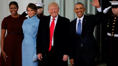 FILE PHOTO: U.S. President Barack Obama (R) and first lady Michelle Obama (L) greet U.S. President-elect Donald Trump and his wife Melania for tea before the inauguration at the White House in Washington, U.S. January 20, 2017. REUTERS/Jonathan Ernst/File Photo