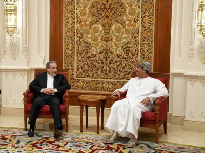 Iran's Foreign Minister Abbas Araqchi is welcomed by an Omani official upon his arrival in Muscat, Oman, in this handout image obtained on February 6, 2026. Iranian Foreign Ministry/WANA (West Asia News Agency)/Handout via REUTERS ATTENTION EDITORS - THIS PICTURE WAS PROVIDED BY A THIRD PARTY