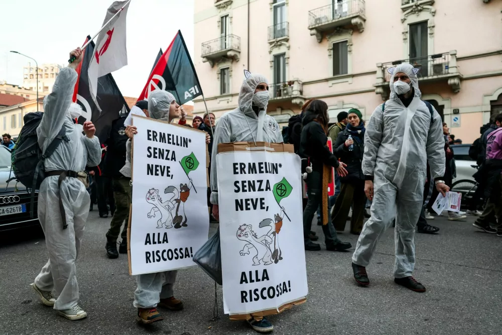 Demonstrators protest against the environmental, economic and social impact of the Milano-Cortina 2026 Winter Olympics, in Milan, Italy, February 7, 2026. REUTERS/Claudia Greco
