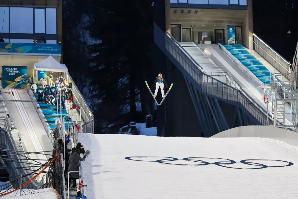 Italija, Predazzu.Zimske olimpijske igre 2026.Trening slovenskih smucarskih skakalcev.Smucarska skakalka Katra Komar.