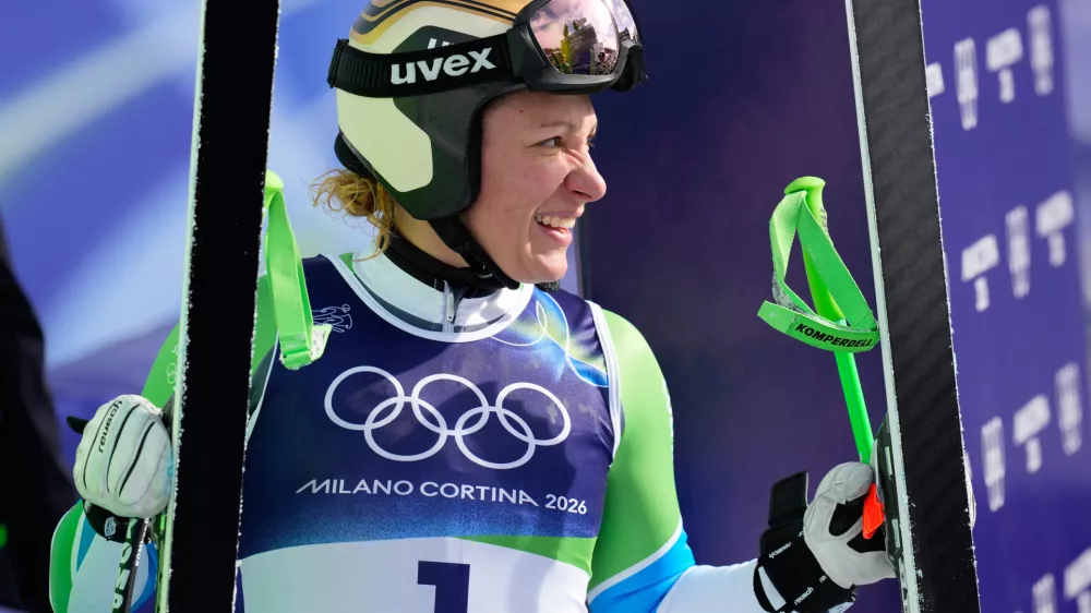 Slovenia's Ilka Stuhec at the finish area during an alpine ski, women's downhill official training, at the 2026 Winter Olympics, in Cortina d'Ampezzo, Italy, Friday, Feb. 6, 2026. (AP Photo/Giovanni Auletta)